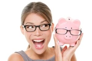 woman holding a coin pig